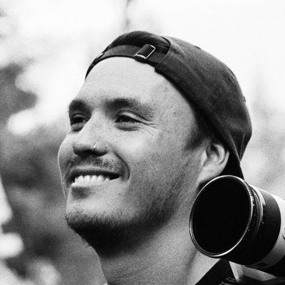 Blake Pickup with a camera on his shoulder